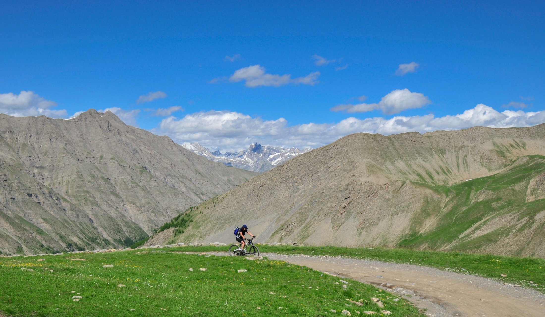 Biking the Parpaillon road with Monte Viso in the background