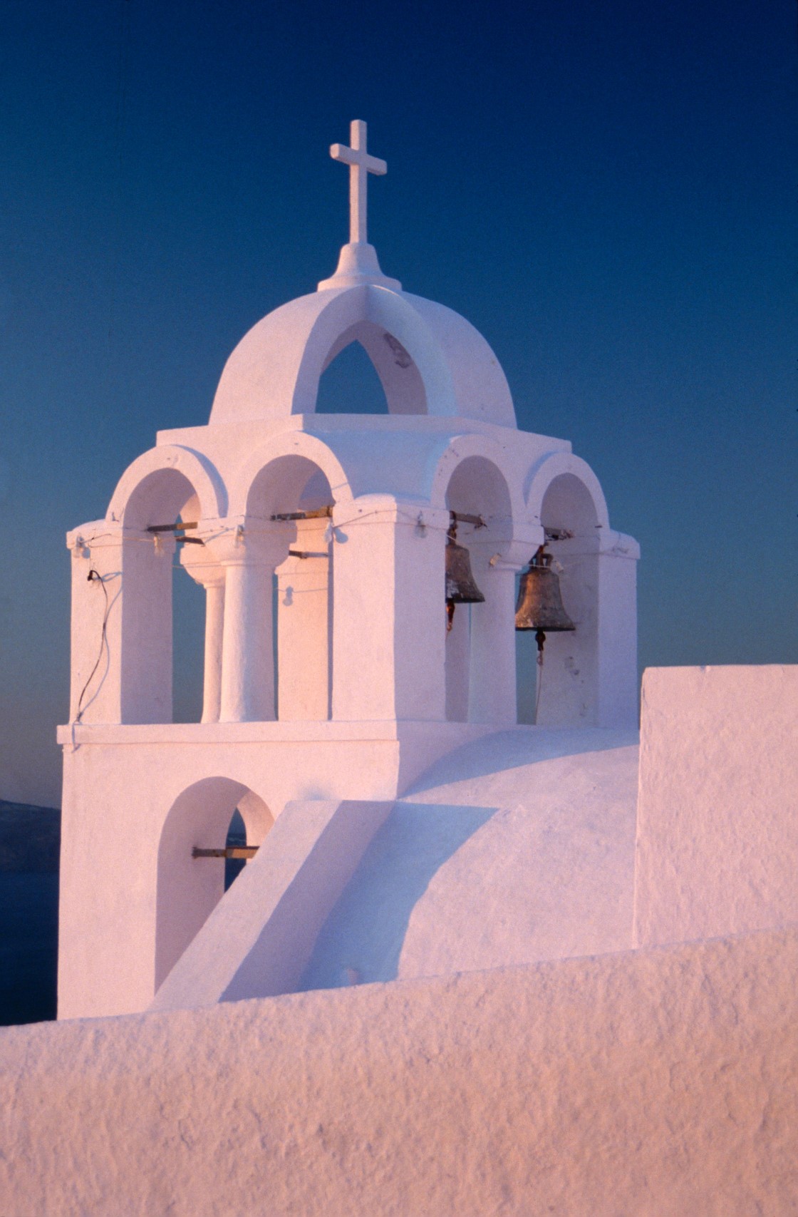 Mystic sunset light on a greek Church on Santorini